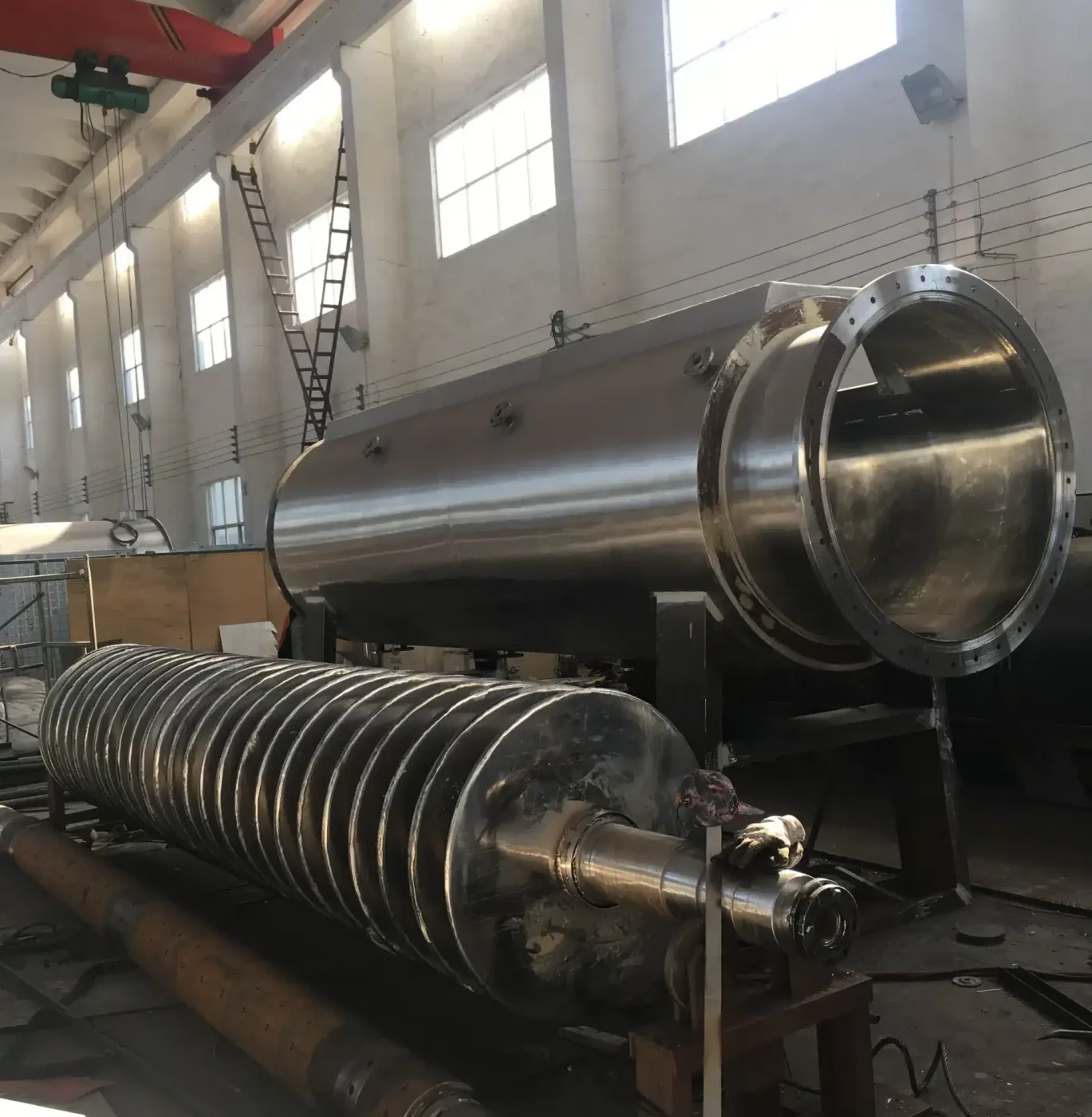 Stacked hollow discs mounted on a single shaft, removed from a SINOTHERMO disc dryer housing