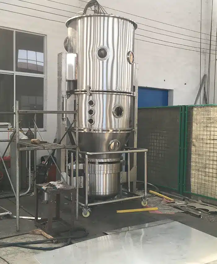 A Fluidized Bed Granulator for Mixing, Granulating and Drying in One Step