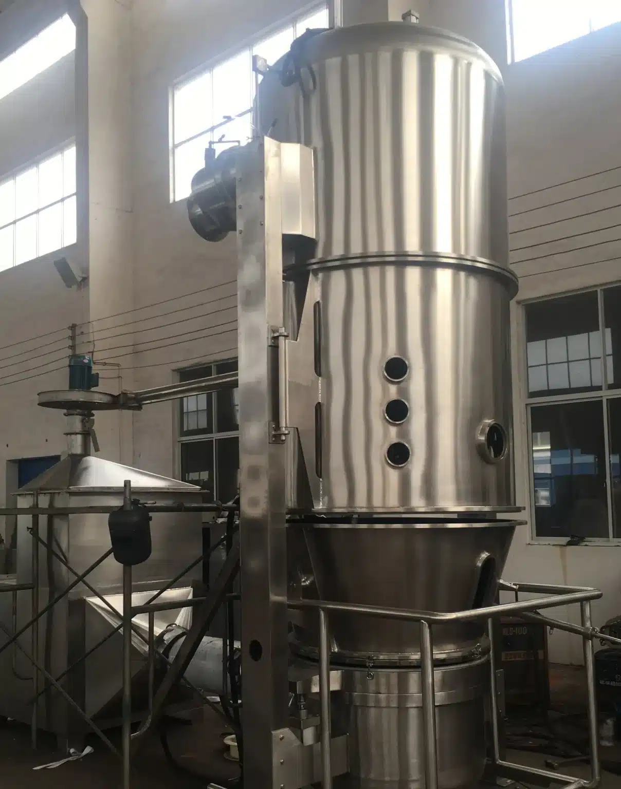 A Fluidized Bed Spray Granulator for High-Excipient, Heat-Sensitive Granulation