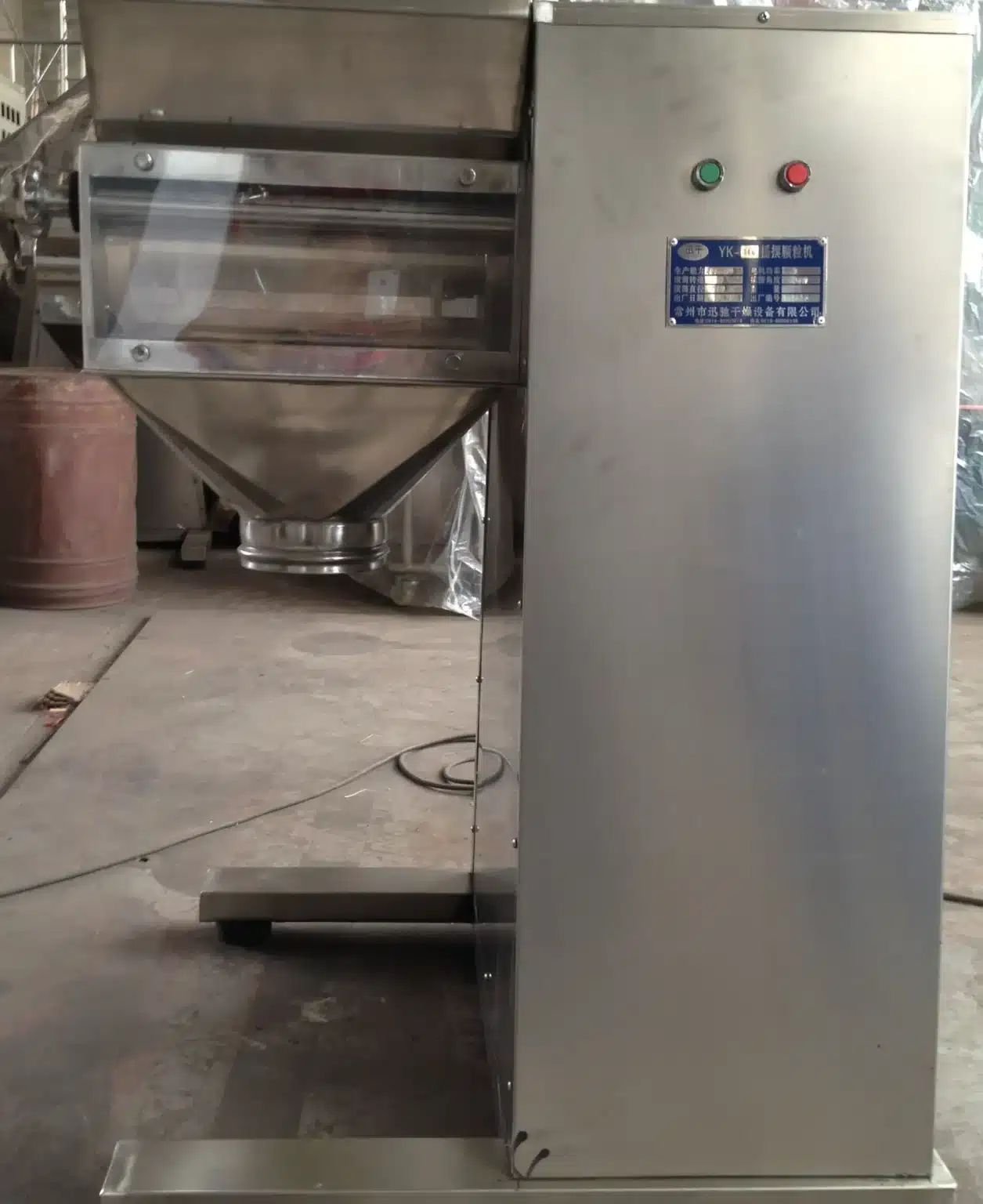 An Oscillating Granulator for Precise Round Granule Formation