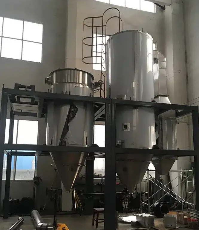 A Pressure-Nozzle Spray Dryer for Controlled Granule Drying