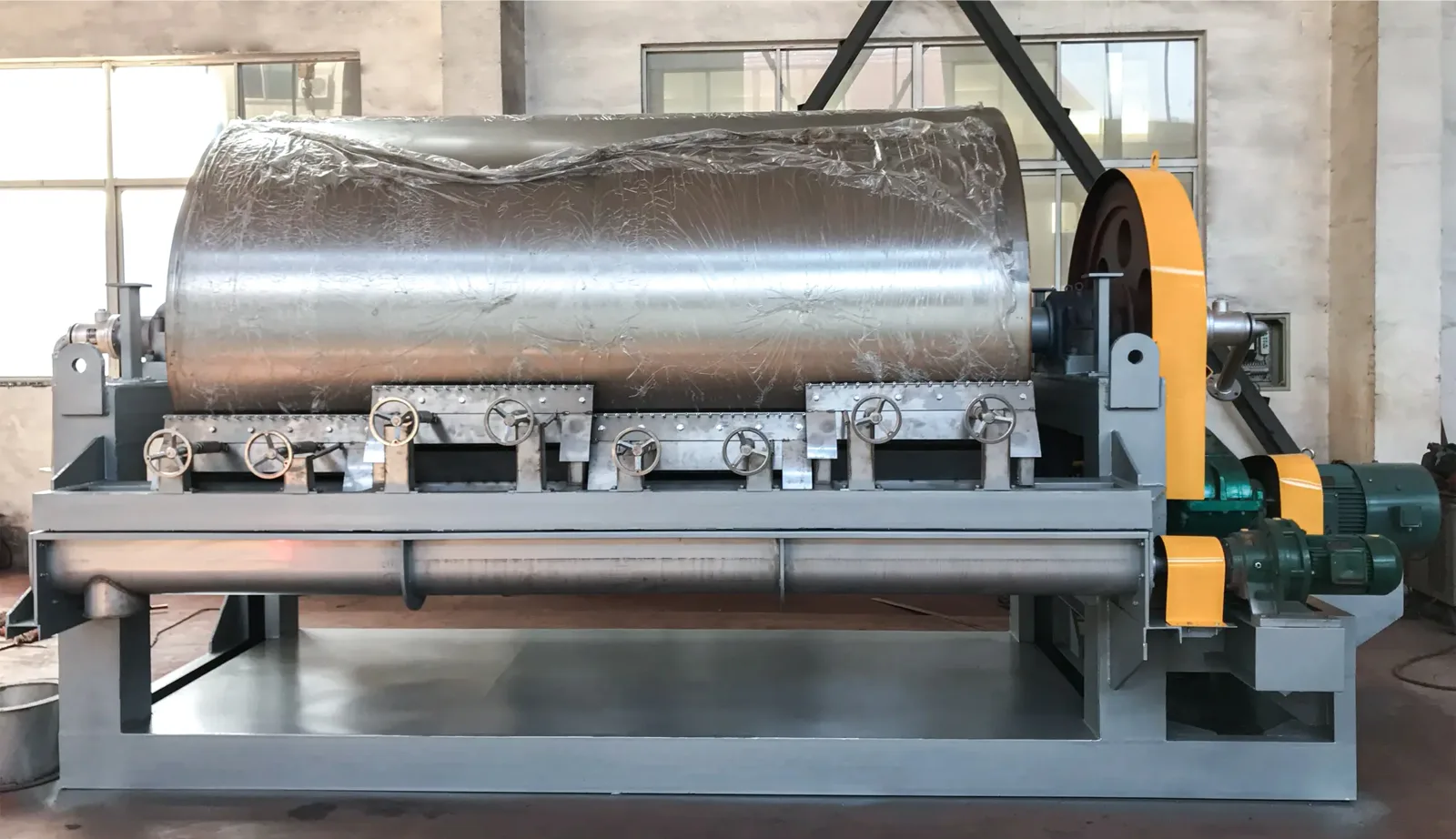A Drum Scraper Dryer for Continuous Film Drying of Pastes