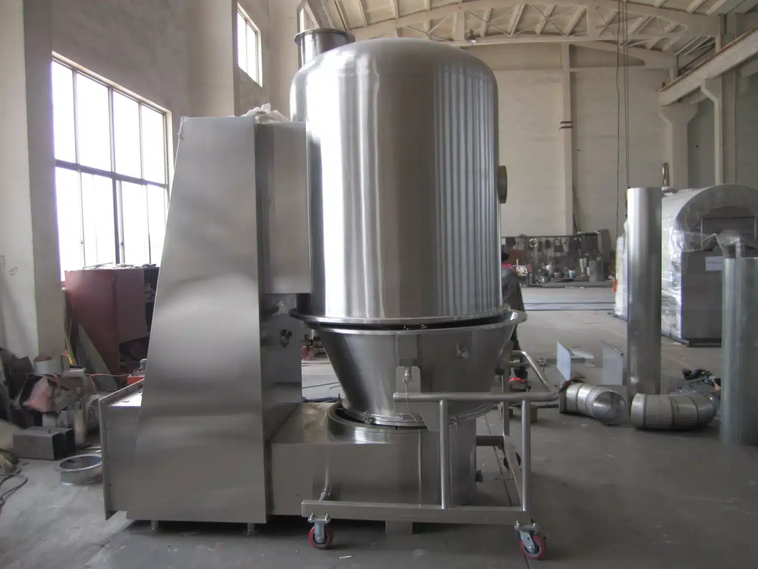 A Vertical Blending Fluidized Bed Dryer for Heavy-Load Batch Processing